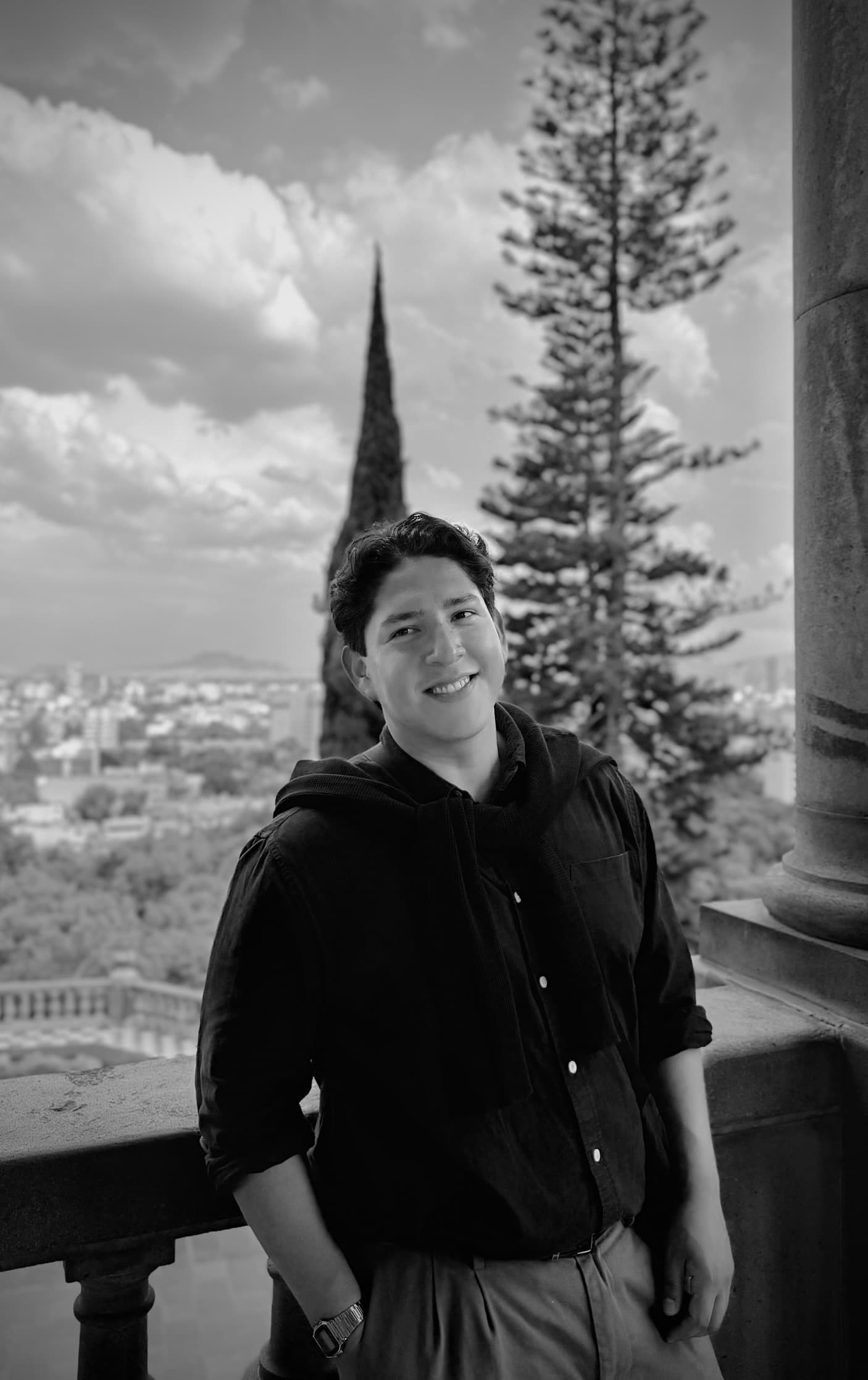 Javier Padilla standing outdoors and smiling